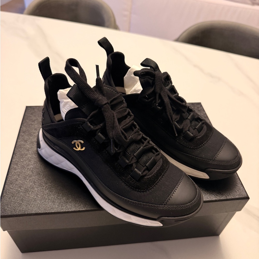 CHANEL Black Sneakers with Gold Accent brand new